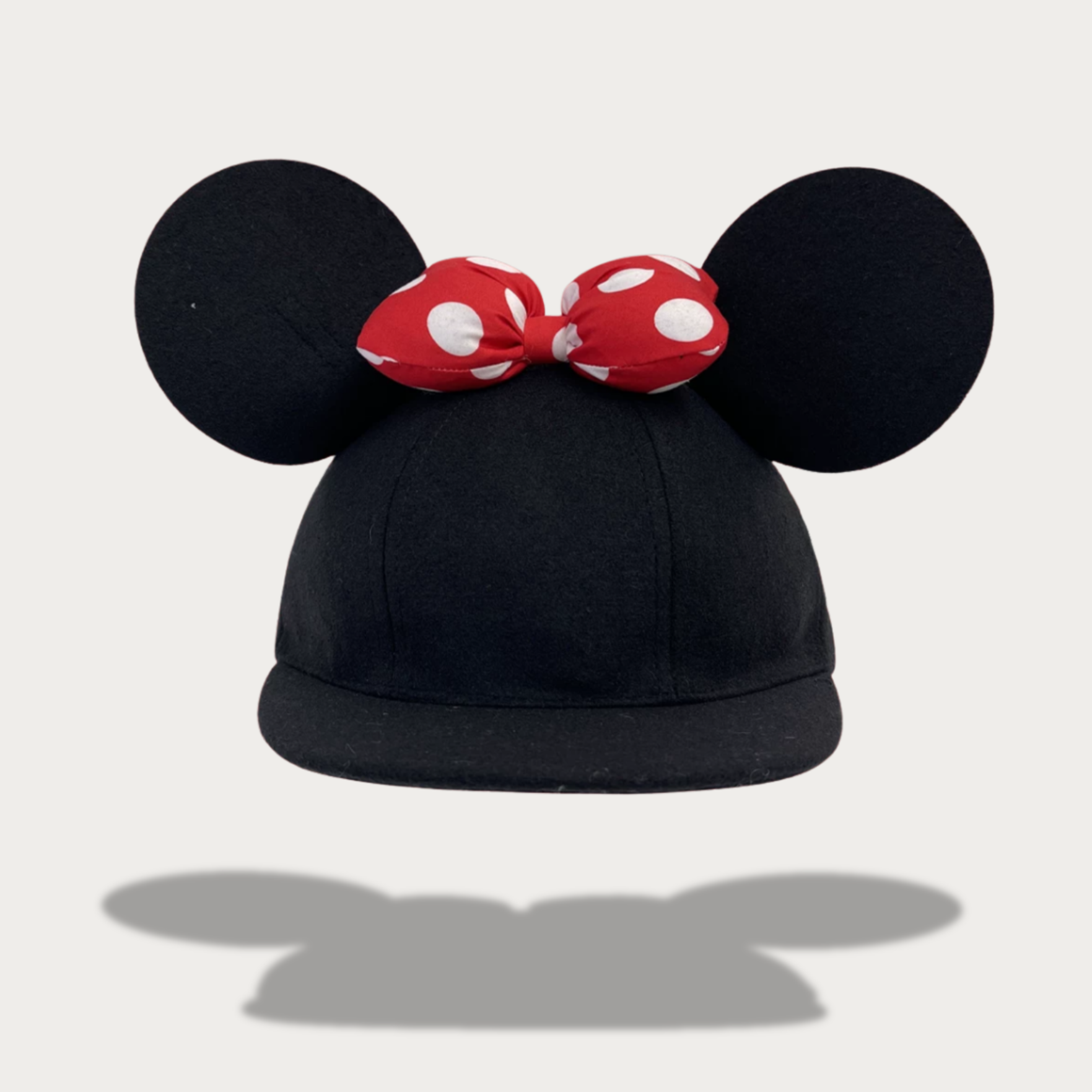 Minnie Mouse hat with ears and polka-dot bow for Disney trips