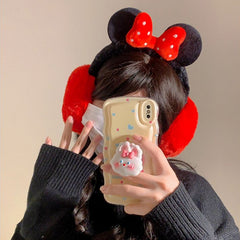 Fluffy plush ear muffs with red bow, soft black band, and cozy red ear covers – cute winter accessory for kids and teens