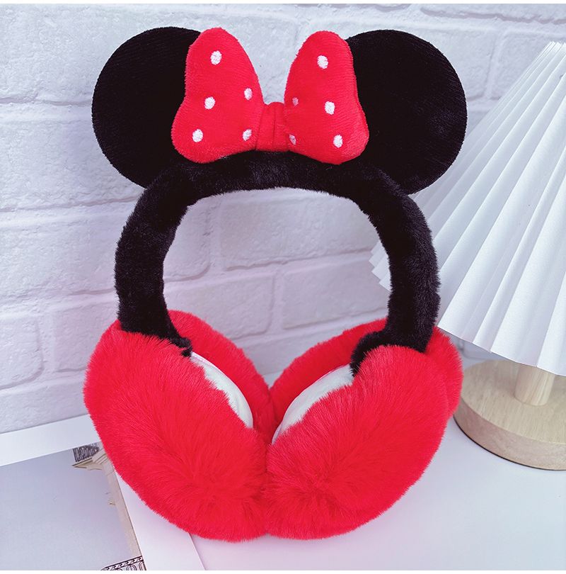 Fluffy plush ear muffs with red bow, soft black band, and cozy red ear covers – cute winter accessory for kids and teens