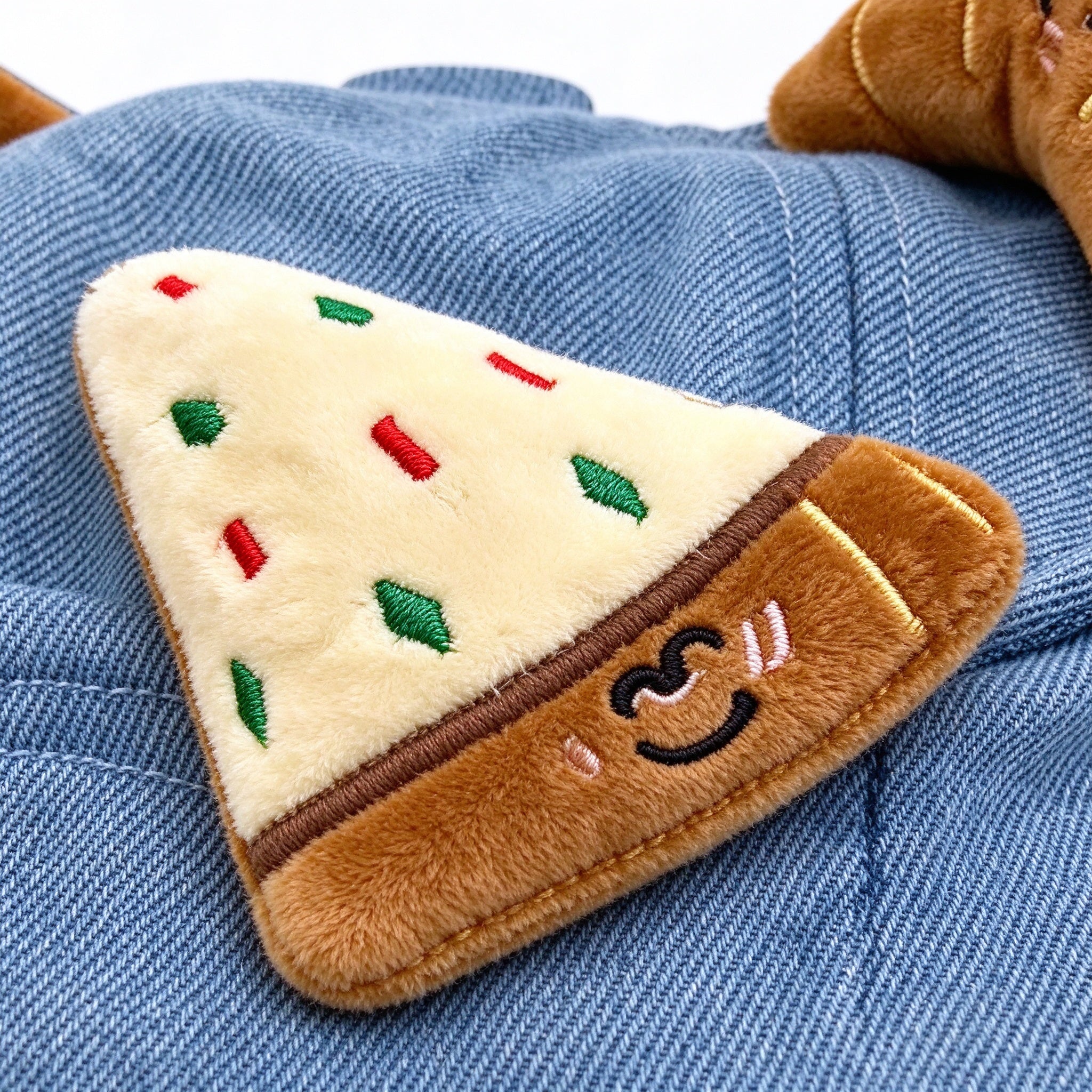 Close-up of the plush pizza slice patch