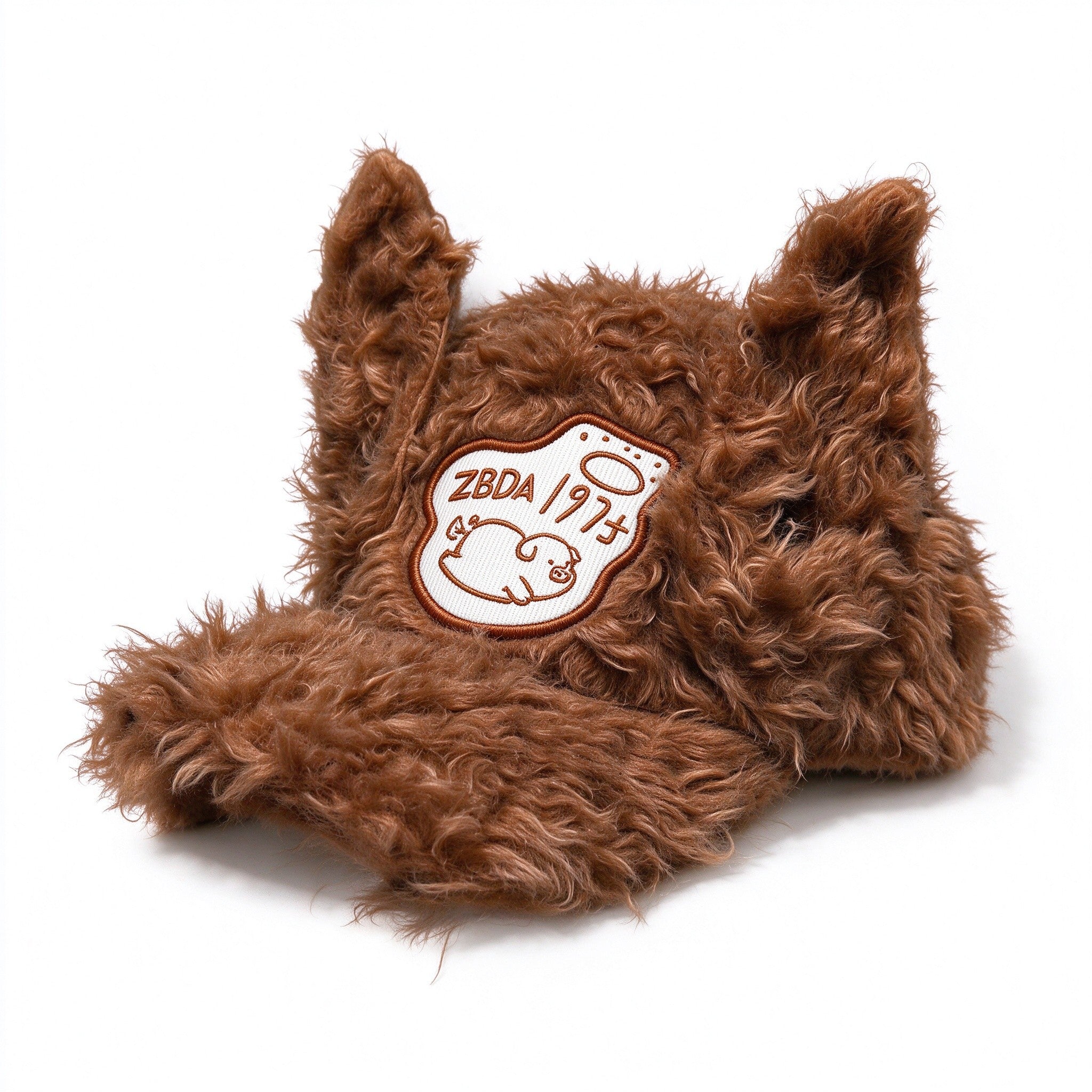 Brown fuzzy plush baseball cap with tall cat ears, front view
