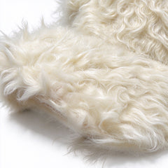Close-up of the shaggy plush texture on the cap brim