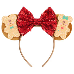 Festive gingerbread ears Christmas headband with cookie characters and holiday bow – cute holiday accessory.