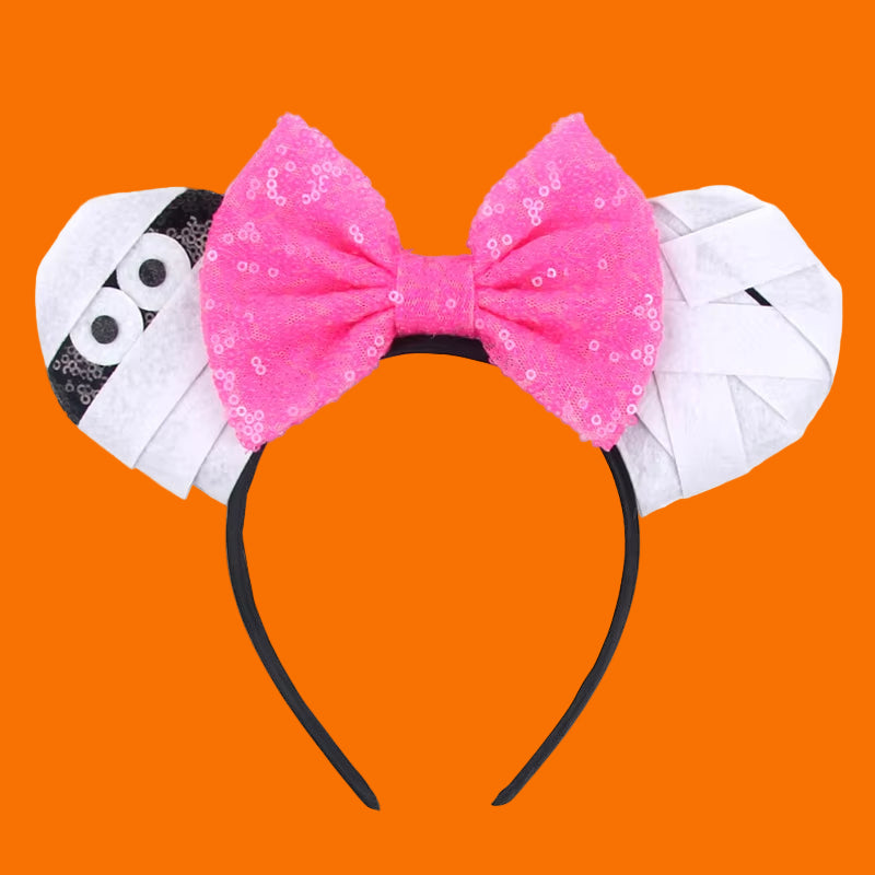 Sequin bow mummy ears headband – add haunted Disney magic to costumes and theme park trips!