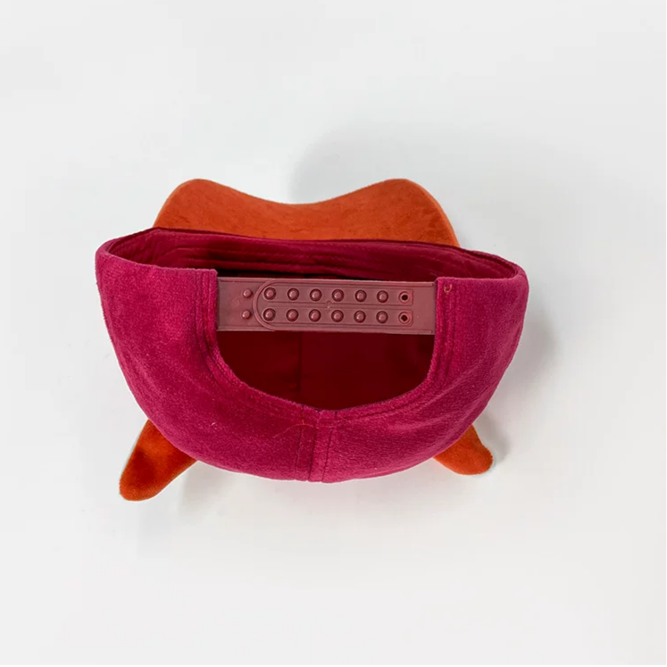 Plush fox baseball cap with embroidered eyes, nose, paw print, and 3D fox ears in soft velvety fabric.