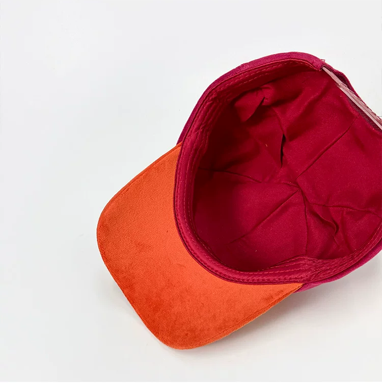Plush fox baseball cap with embroidered eyes, nose, paw print, and 3D fox ears in soft velvety fabric.